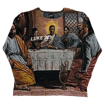 Knitted sweater featuring a religious Last Supper scene artwork.