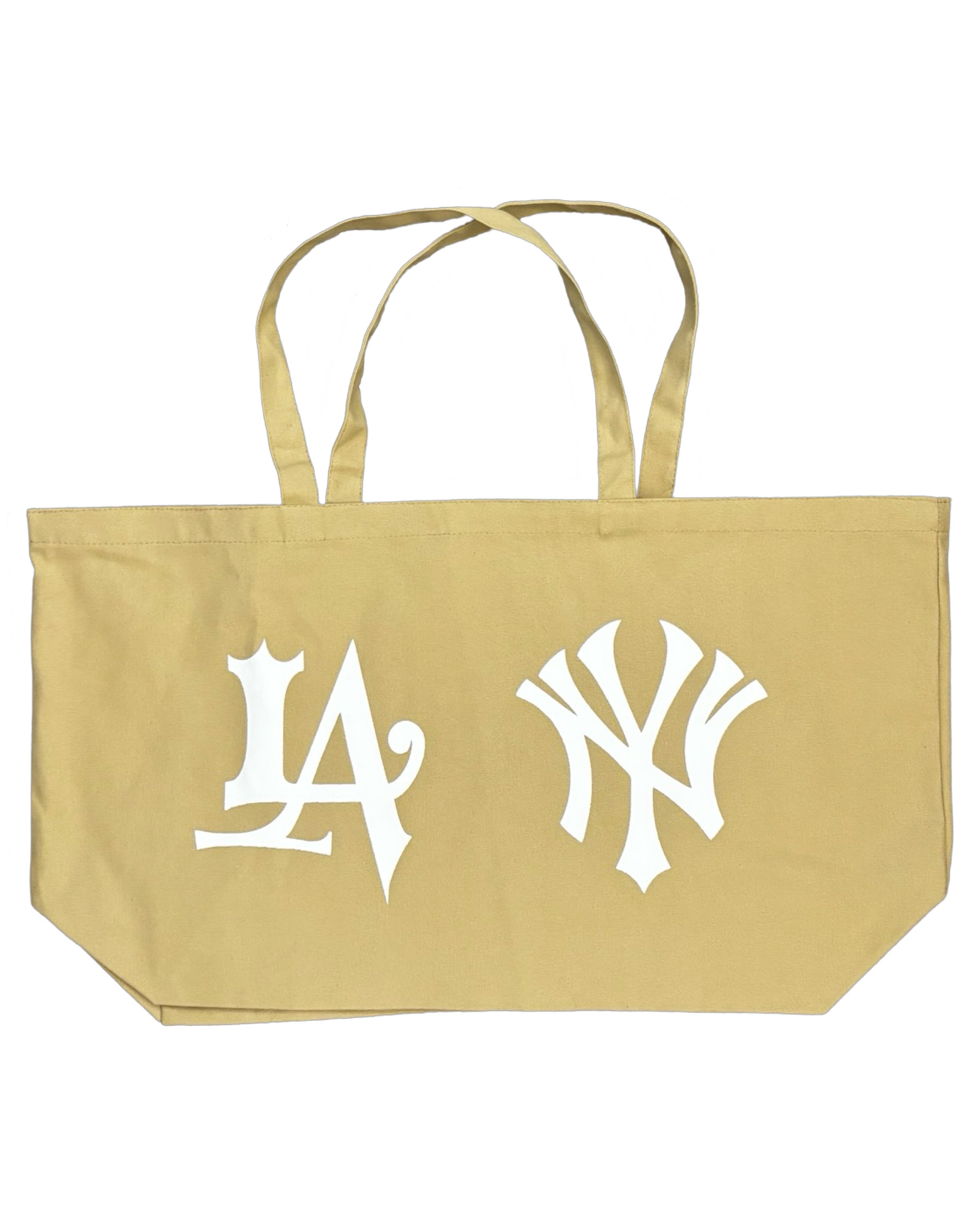 Beige tote bag featuring white LA and NY logos.