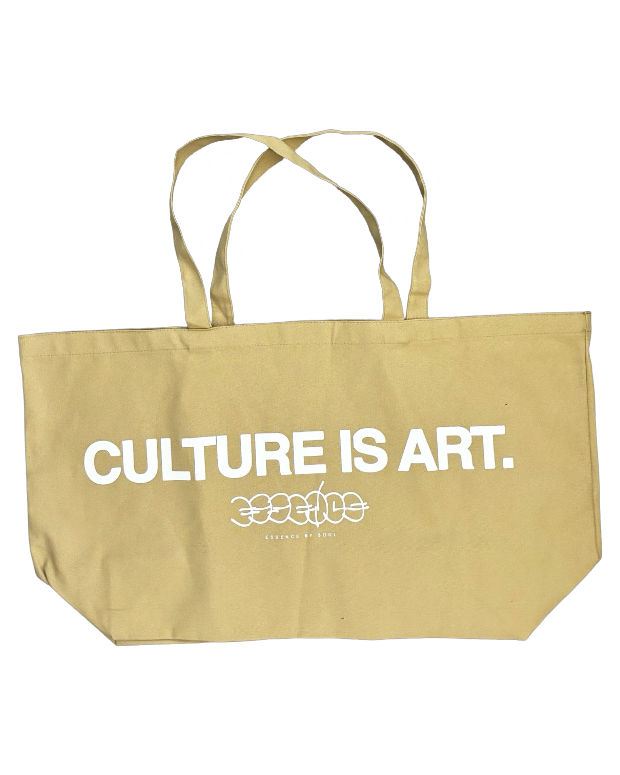 Beige tote bag with ’CULTURE IS ART.’ printed in white text.