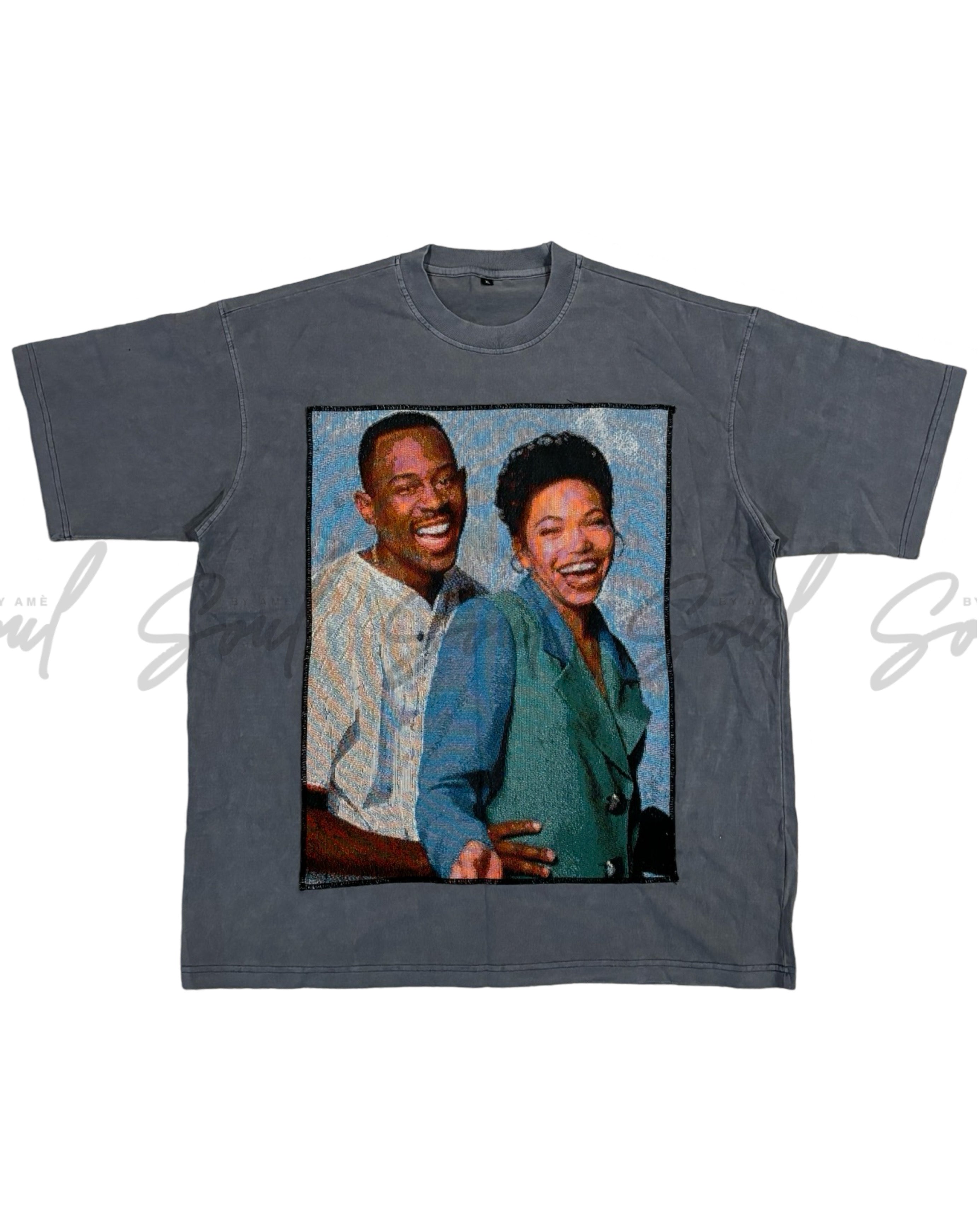 Gray t-shirt featuring a printed photograph of a smiling couple.