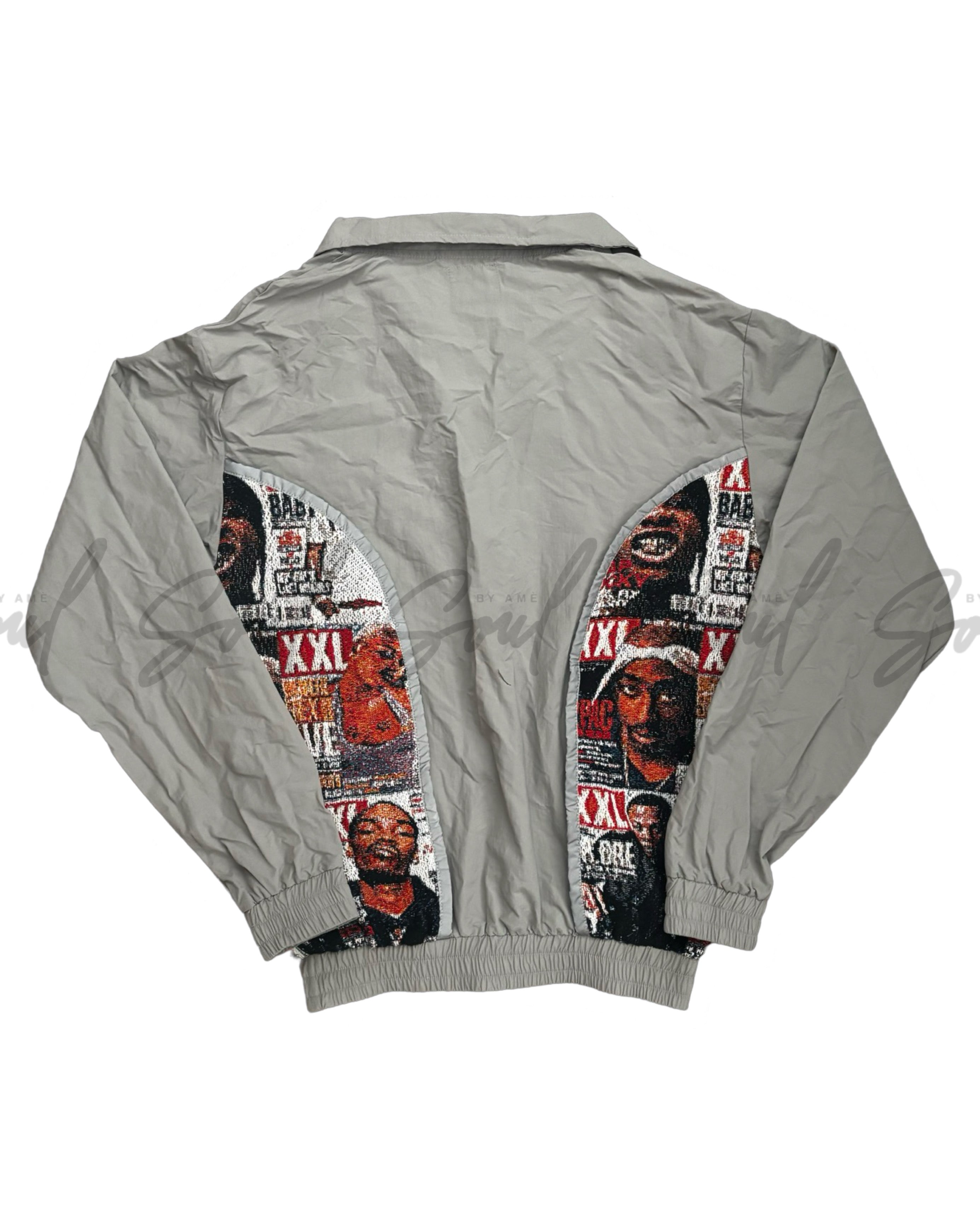 Gray jacket with graphic designs on the back featuring magazine-style collages.