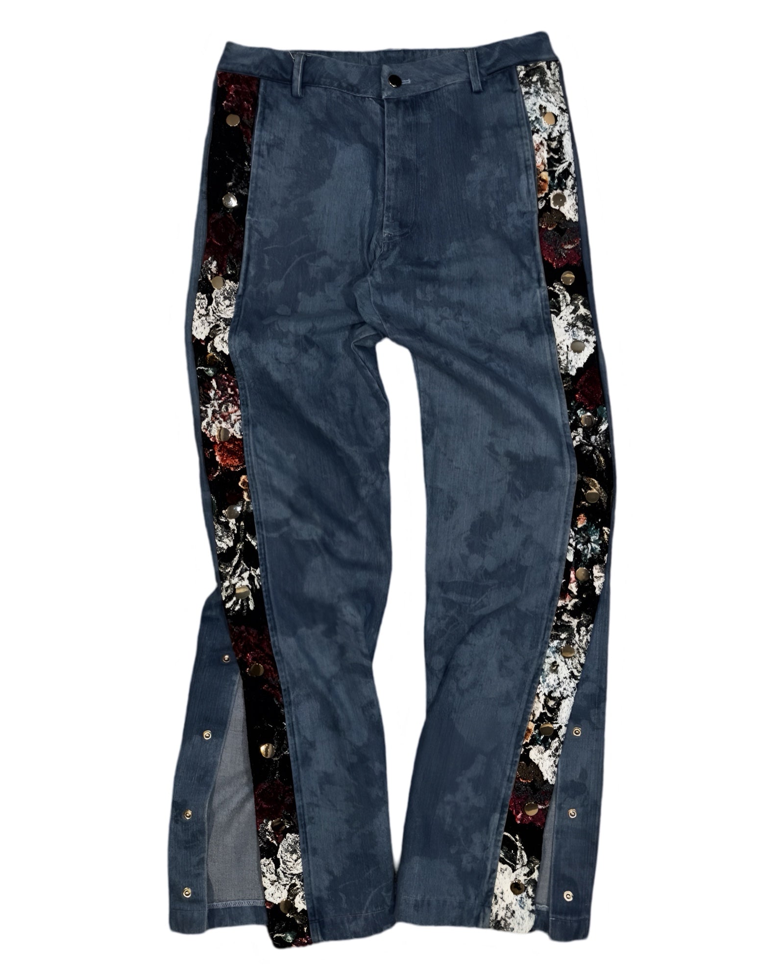 Blue jeans with decorative floral side panels.